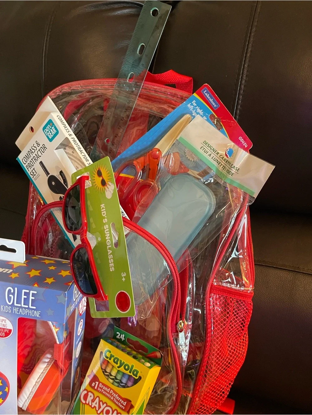 Crayola Clear Backpack with Red Accents and Assorted Art Supplies